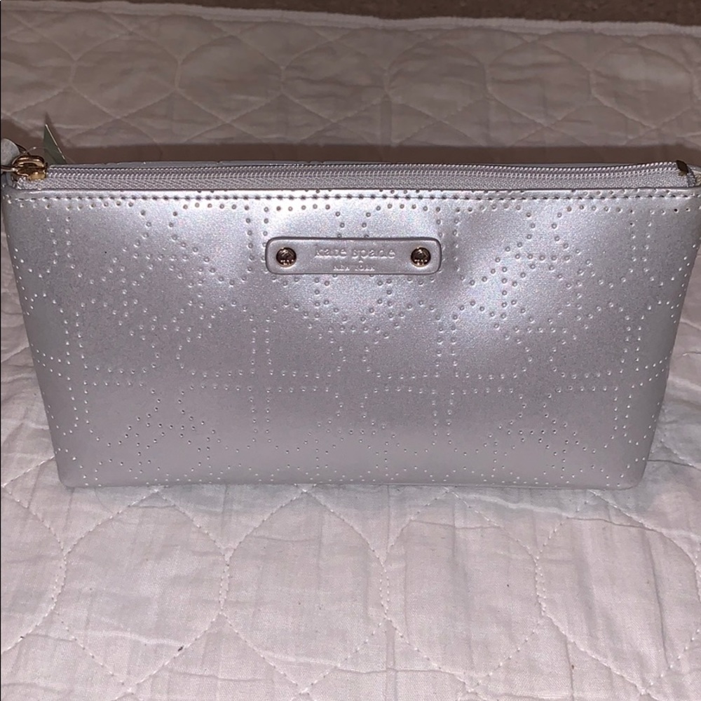 Kate spade makeup bag in silver.